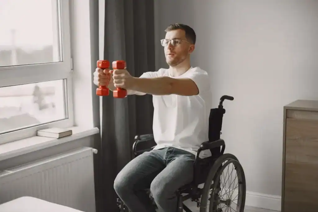 Image of man doing exercise in his wheelchair to aid weight loss Leicestershire